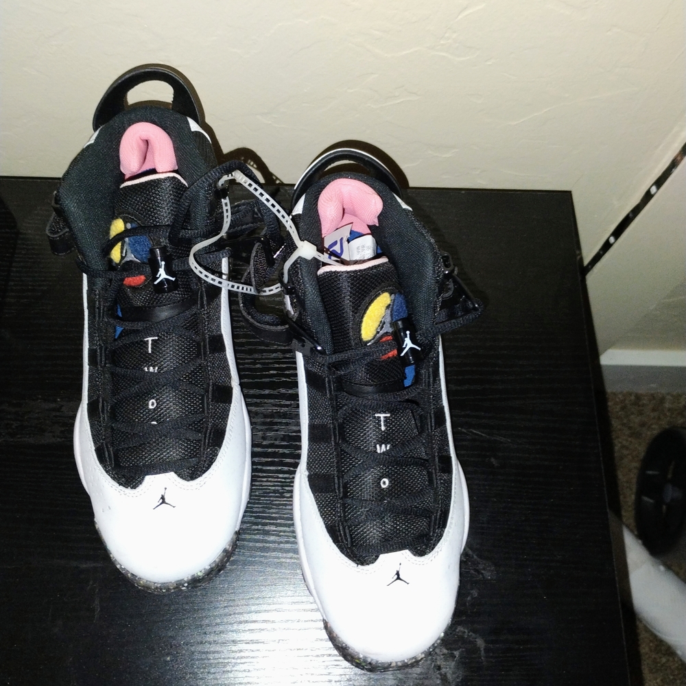 Jordan Kids Black and White Sneakers with Pink and Yellow Accents